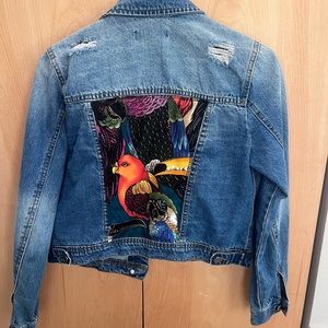 Beautiful Jean Jacket with custom embroidered pattern on back